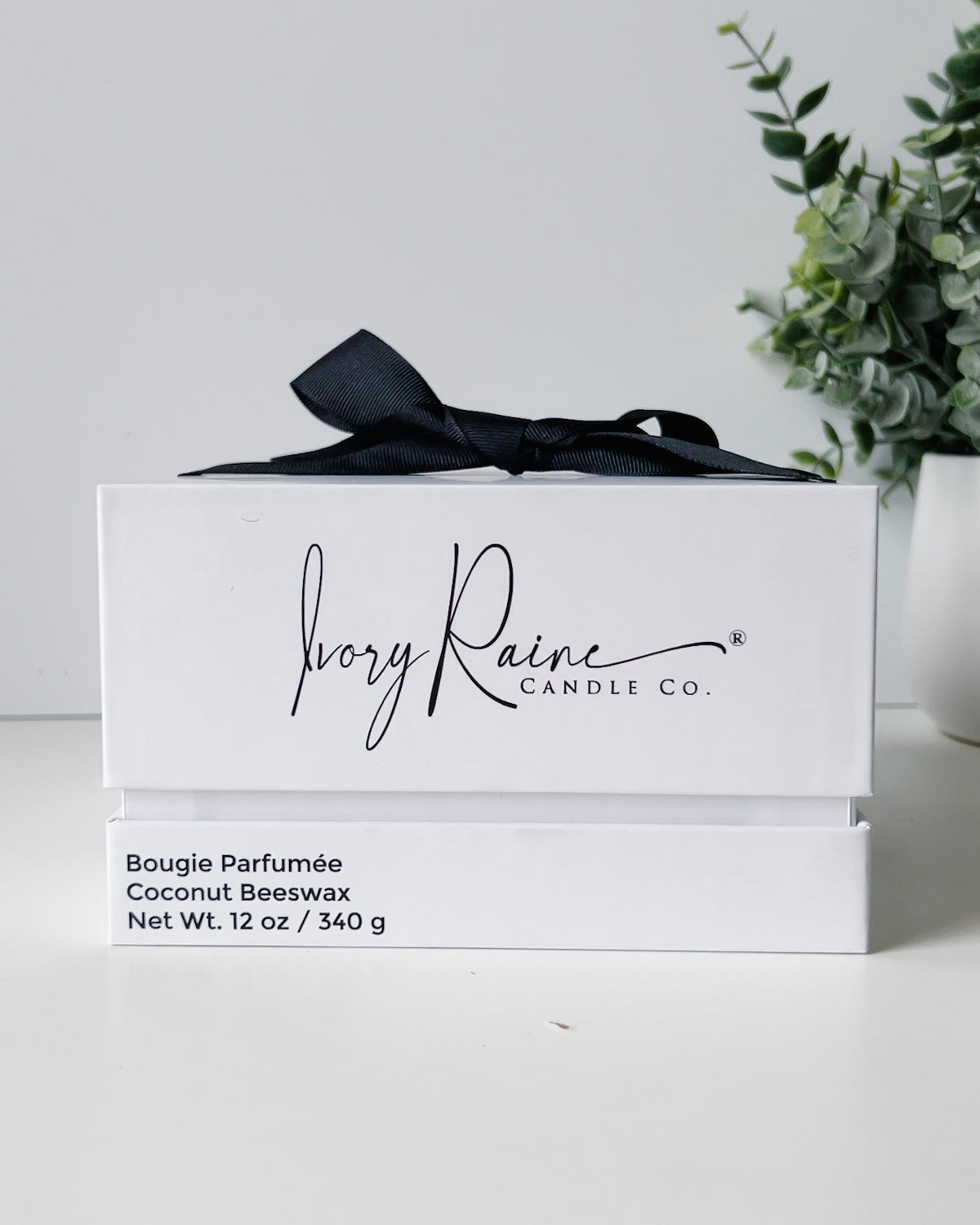 Candle packaging by Ivory Raine Candle Co.