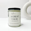 A Great Calm 8oz wood wick candle that smells like Lavender, Bergamot, and Cedar.